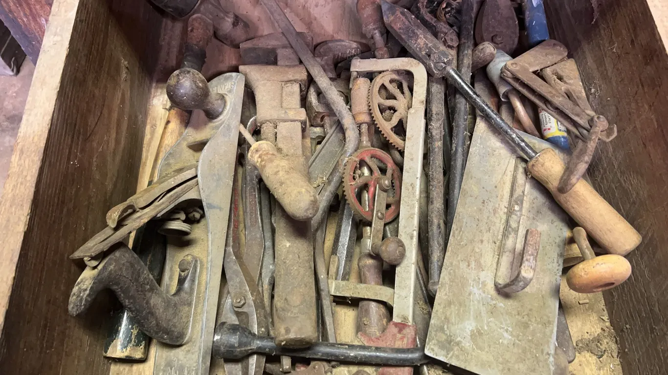 Drawer of Antique Tools Including Pipe Wrench, Stanley Planer, Fence Stretcher & More