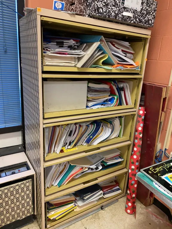 Metal shelf with pull out shelves with doors