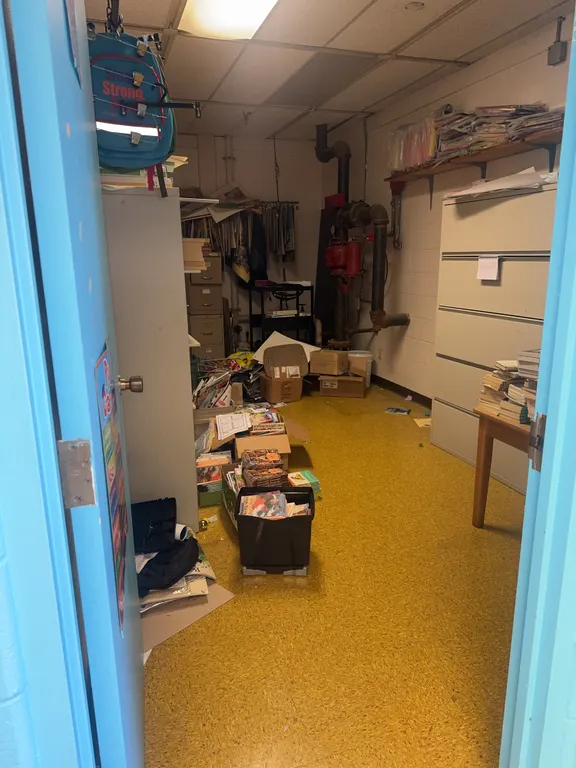 Contents of Room (Books, Filing Cabinets, Bookshelves, Rolling Cart) *Anything Attached To The Wall/Floor Does NOT Go, Only Items That Can Be Easily a