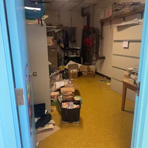 Contents of Room (Books, Filing Cabinets, Bookshelves, Rolling Cart) *Anything Attached To The Wall/Floor Does NOT Go, Only Items That Can Be Easily a