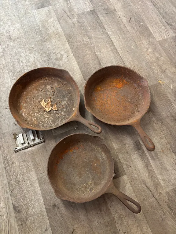 (3)- cast iron skillets