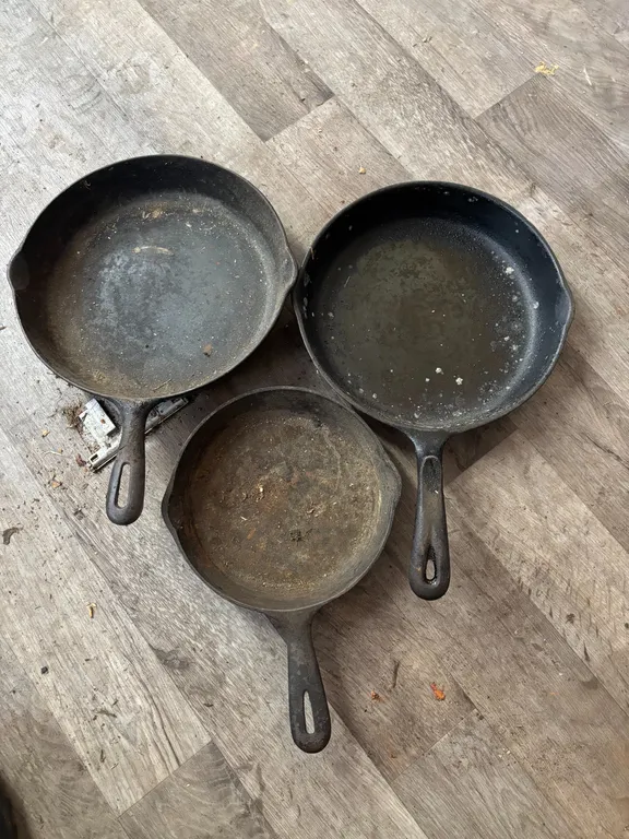 (3)- cast iron skillets