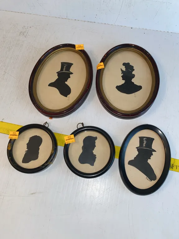 Vintage or antique oval-framed silhouette portrait’s