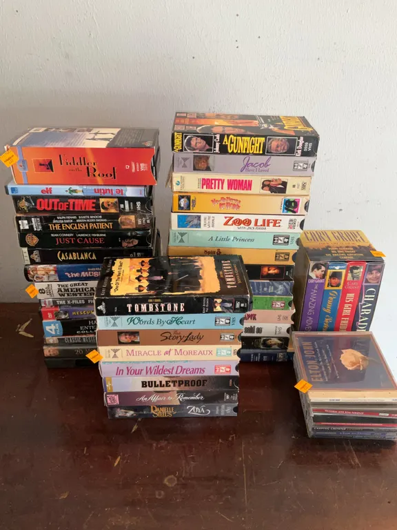 Assortment of VHS Tapes, C.D.s,
