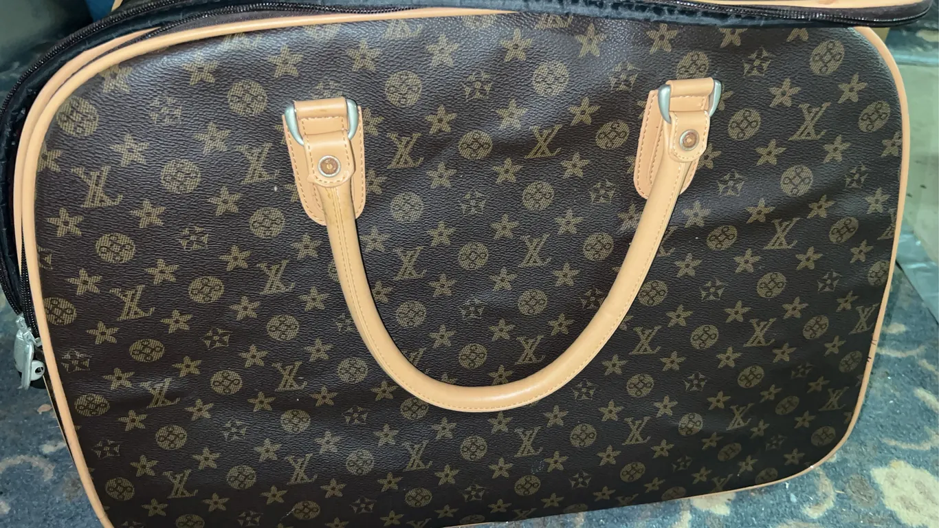 Louis Vitton Luggage Bag (PROBABLY KNOCKOFF)