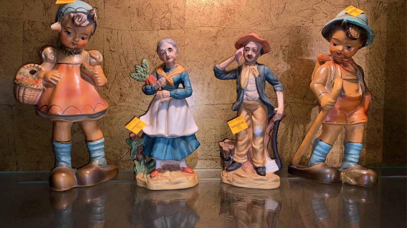 M.I. Hummel "Little Cellist" porcelain figurine’s