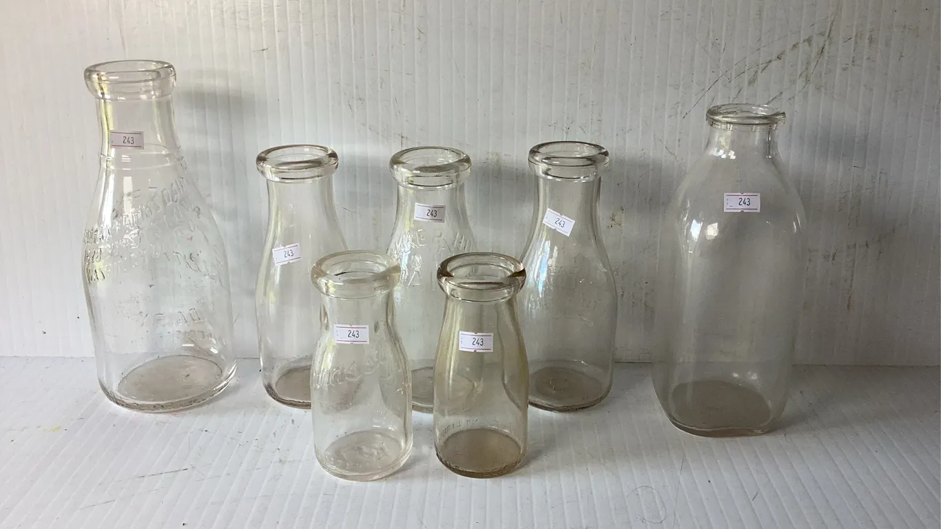 7 Vintage Dairy Bottles