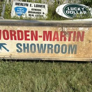 Double-sided advertising sign for WORDEN-MARTIN, featuring 'SHOWROOM' on one side and 'SERVICE' on the other, approximately 72 inches long
