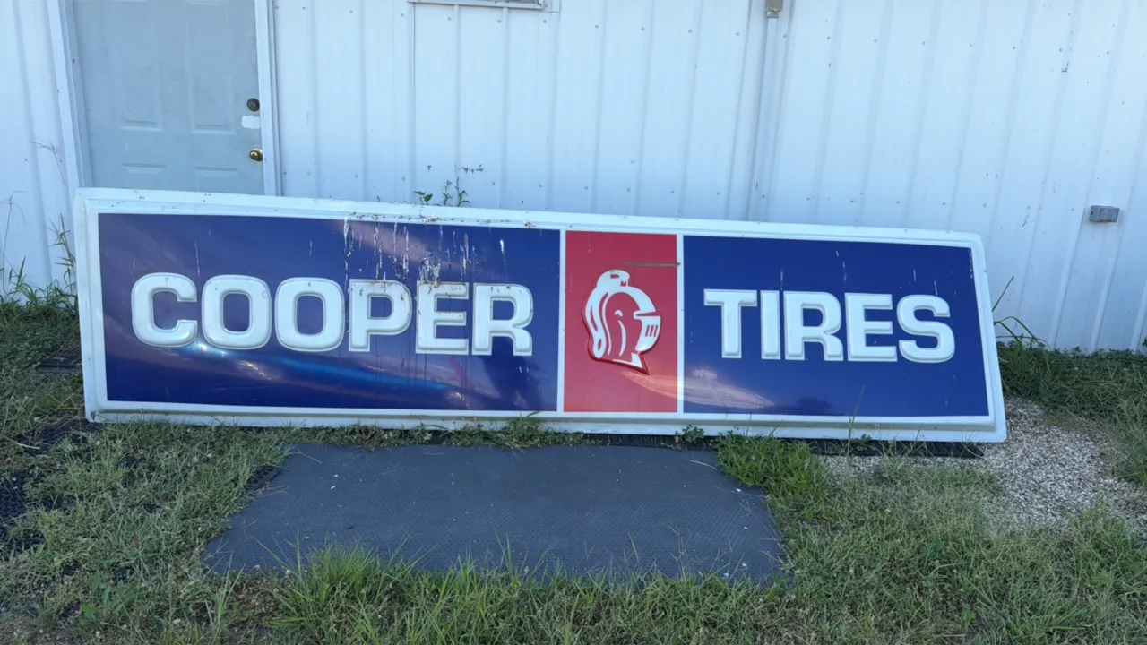 Cooper Tires Commercial Sign with Knight Logo
