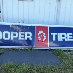 Cooper Tires Commercial Sign with Knight Logo