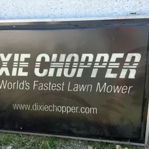 DIXIE CHOPPER Illuminated Commercial Sign, "The World's Fastest Lawn Mower"