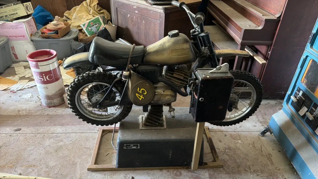 Dirt bike with '45' side plate, gold and black finish