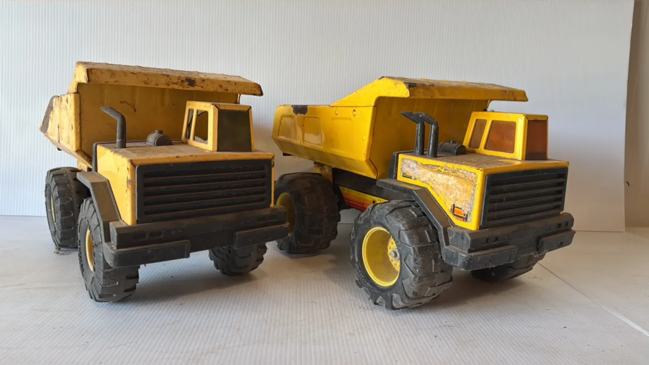 Two Tonka Dump Trucks