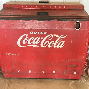 Coca-Cola Vintage Red Electric Cooler with 'DRINK Coca-Cola' and 'HAVE A COKE' Branding.
