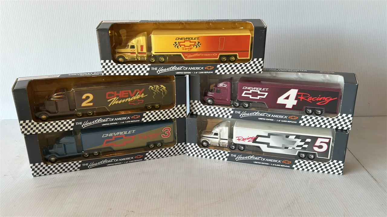 Collection of Five Chevrolet Racing Transporter Replica Model Trucks, in Original Packaging