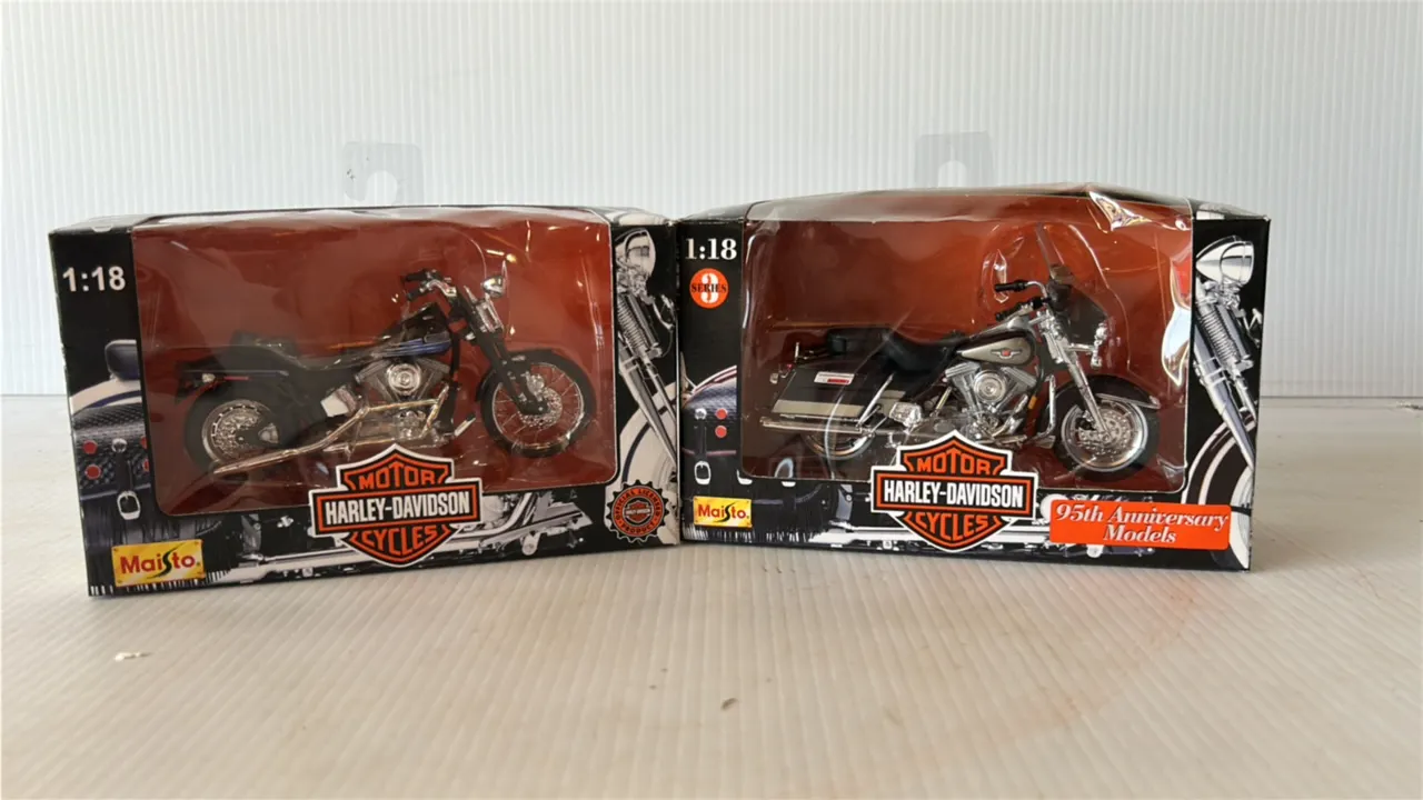 Two Maisto 1:18 Scale Harley-Davidson Model Motorcycles, including a 95th Anniversary Edition