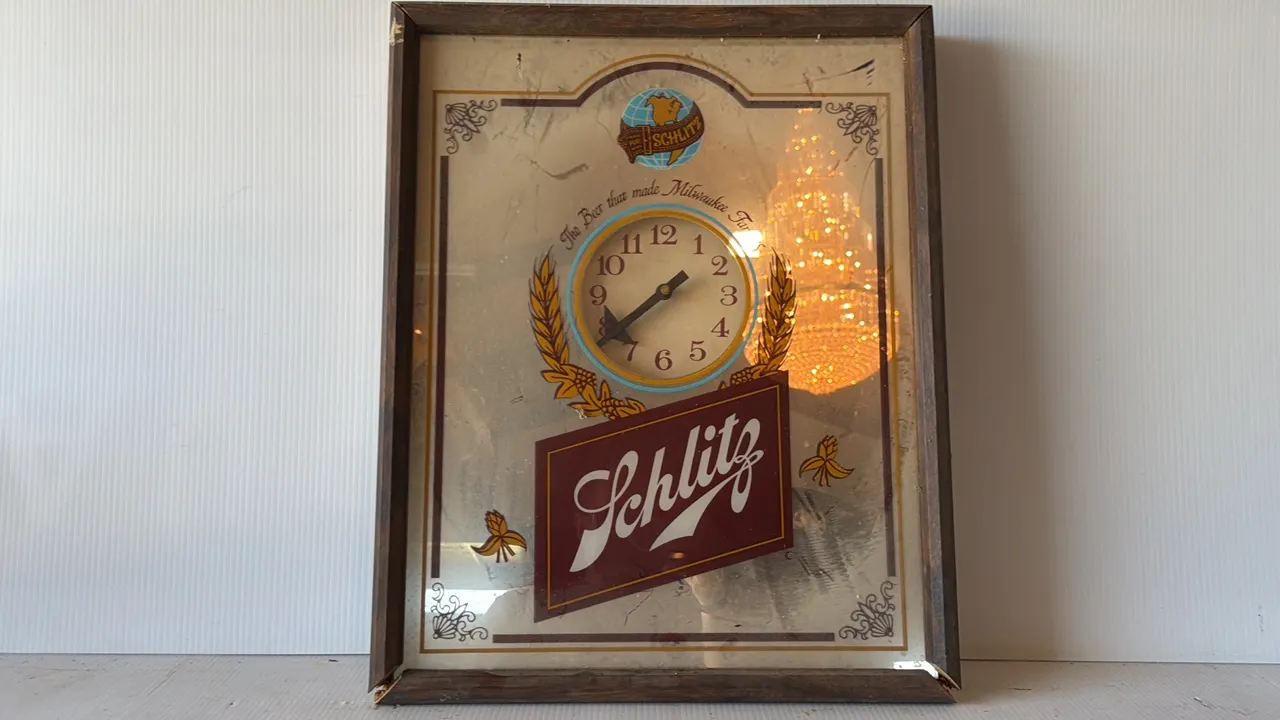 Schlitz Advertising Mirror with Clock Design