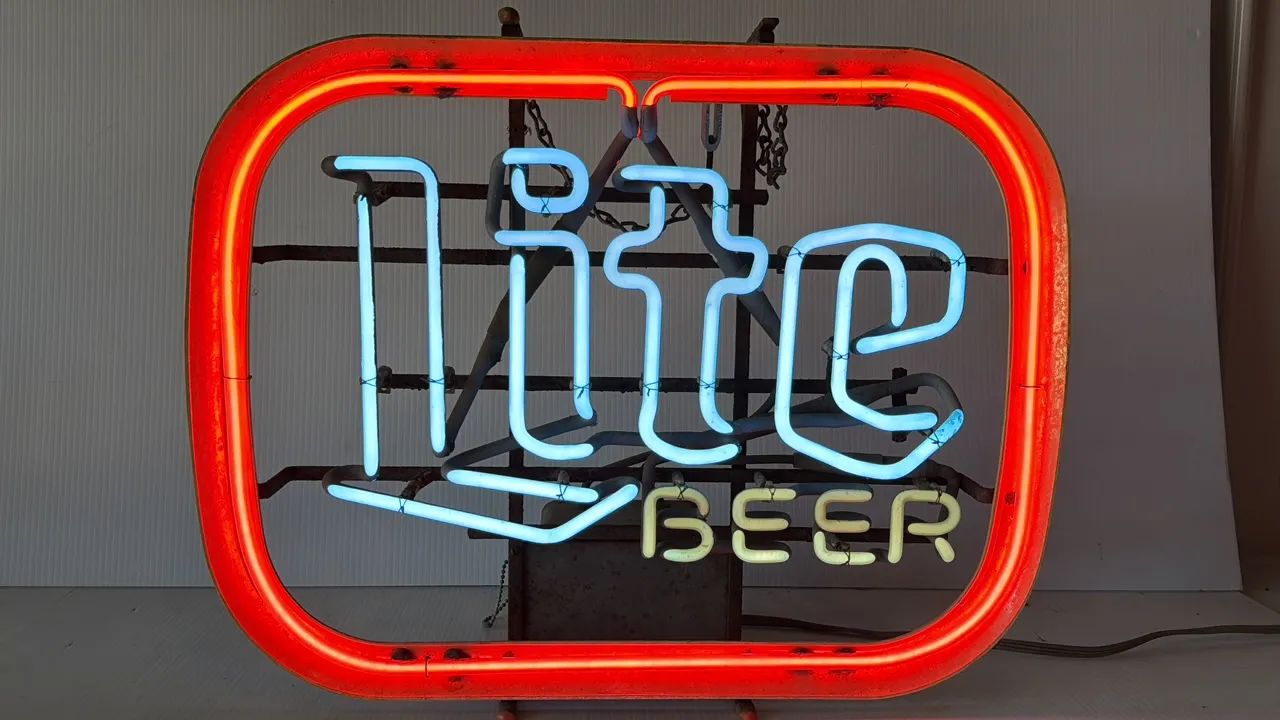 Lite Beer Neon Sign with Red Border, Blue 'Lite', and Yellow 'BEER'