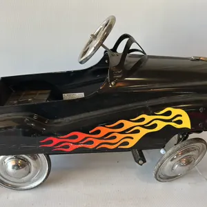Black Pedal Car with Flame Graphics