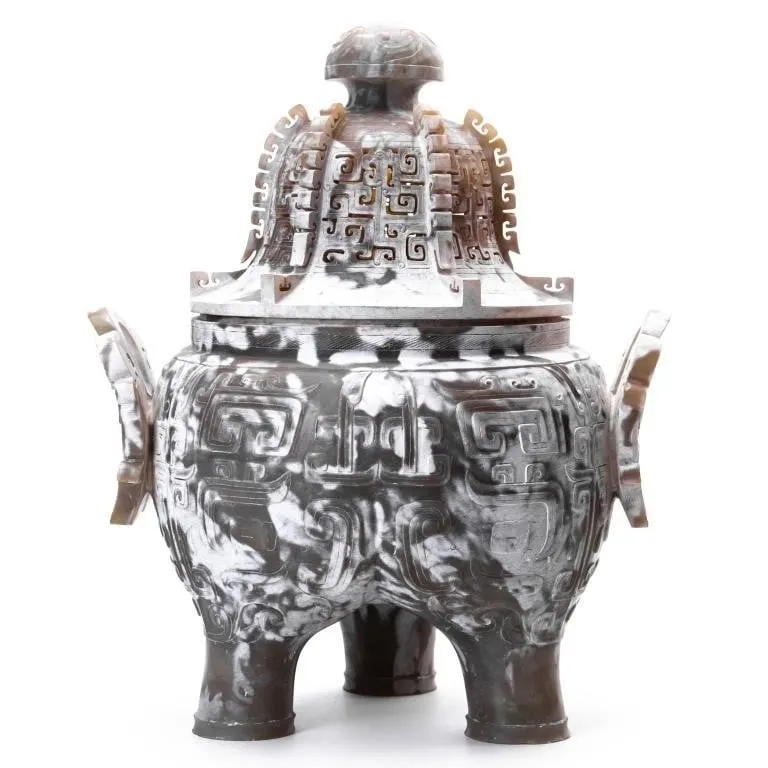 CHINESE ARCHAISTIC CARVED HARDSTONE TRIPOD DING