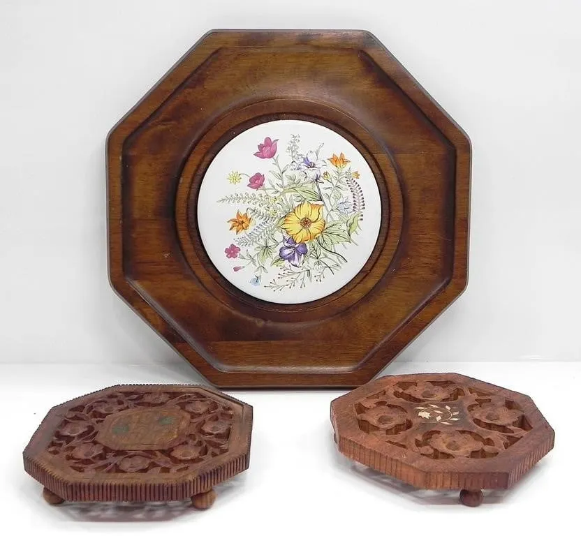 THREE TEAK TRIVETS