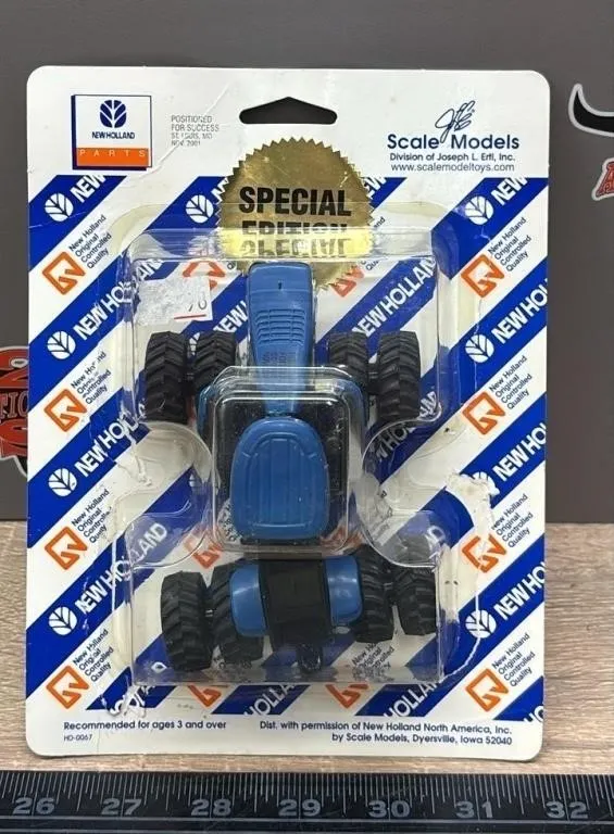 1:64 ERTL New Holland TJ450 Die Cast Tractor.