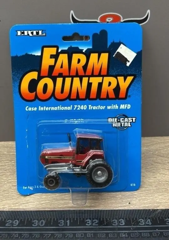1:64 ERTL Farm Country 7240 Tractor w/MFD. Opened
