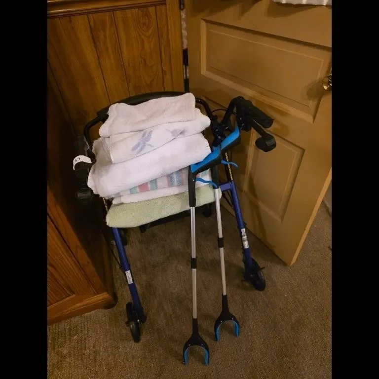 Blue Rollator Walker with Grabbers and Towels