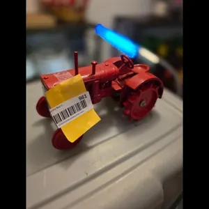 Red Diecast Tractor Toy with Yellow "COLO" Decals