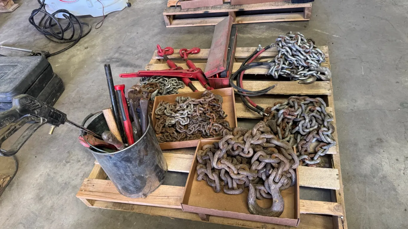 Assorted log chains, chain binders, tools & roadside kit