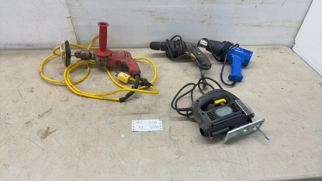 Power Tools: Trademaster 3/8” Drill, Heat Gun, Jigsaw, and Grinder Attachment