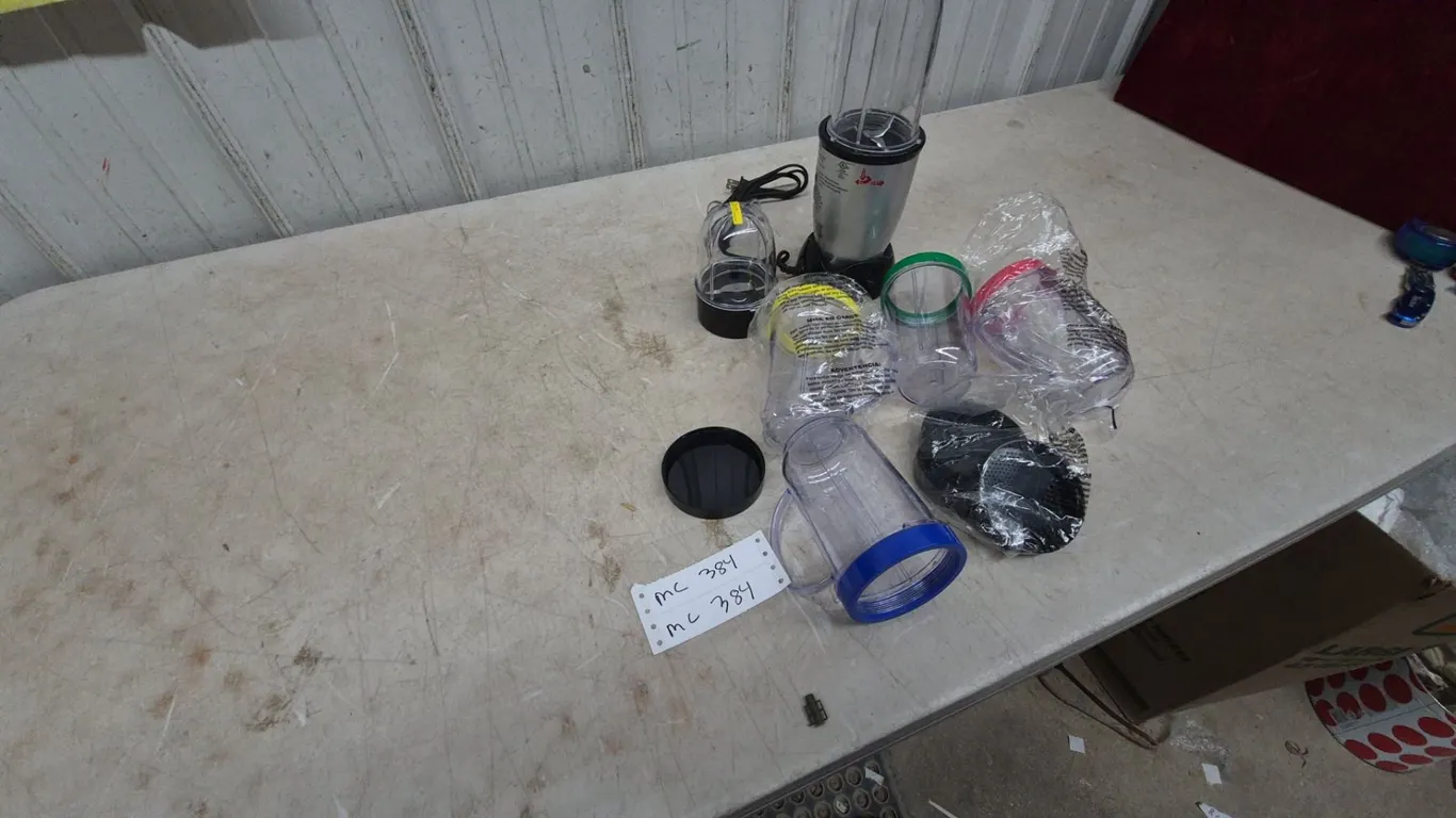Magic Bullet Blender and Accessories: Blender Base, 2 Blade Attachments, 5 Cups, 3 Lids, and More.