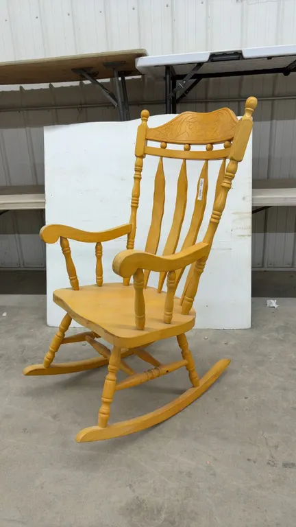 Traditional Wooden Rocking Chair with Carved Floral Backrest and Turned Spindles