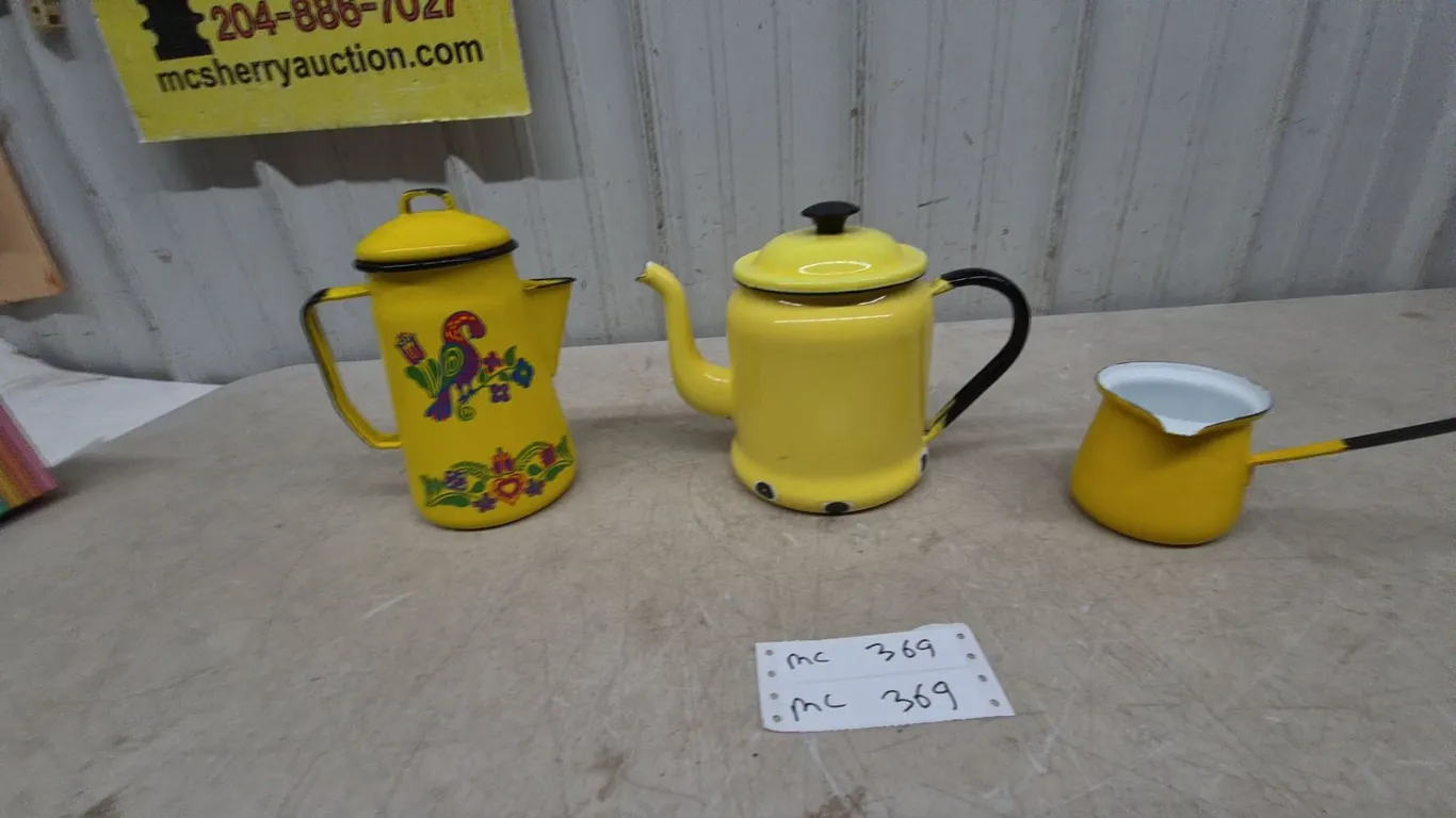 Three Yellow Enamelware Coffee Pots and Saucepan