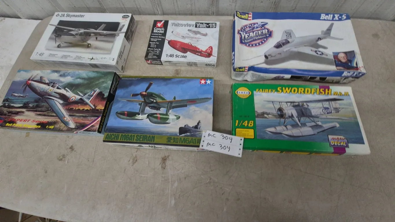 Six 1/48 Scale Model Airplane Kits: Revell O-2A Skymaster, Yakovlev Yak-15, Bell X-5, Bell P-63C Ki
