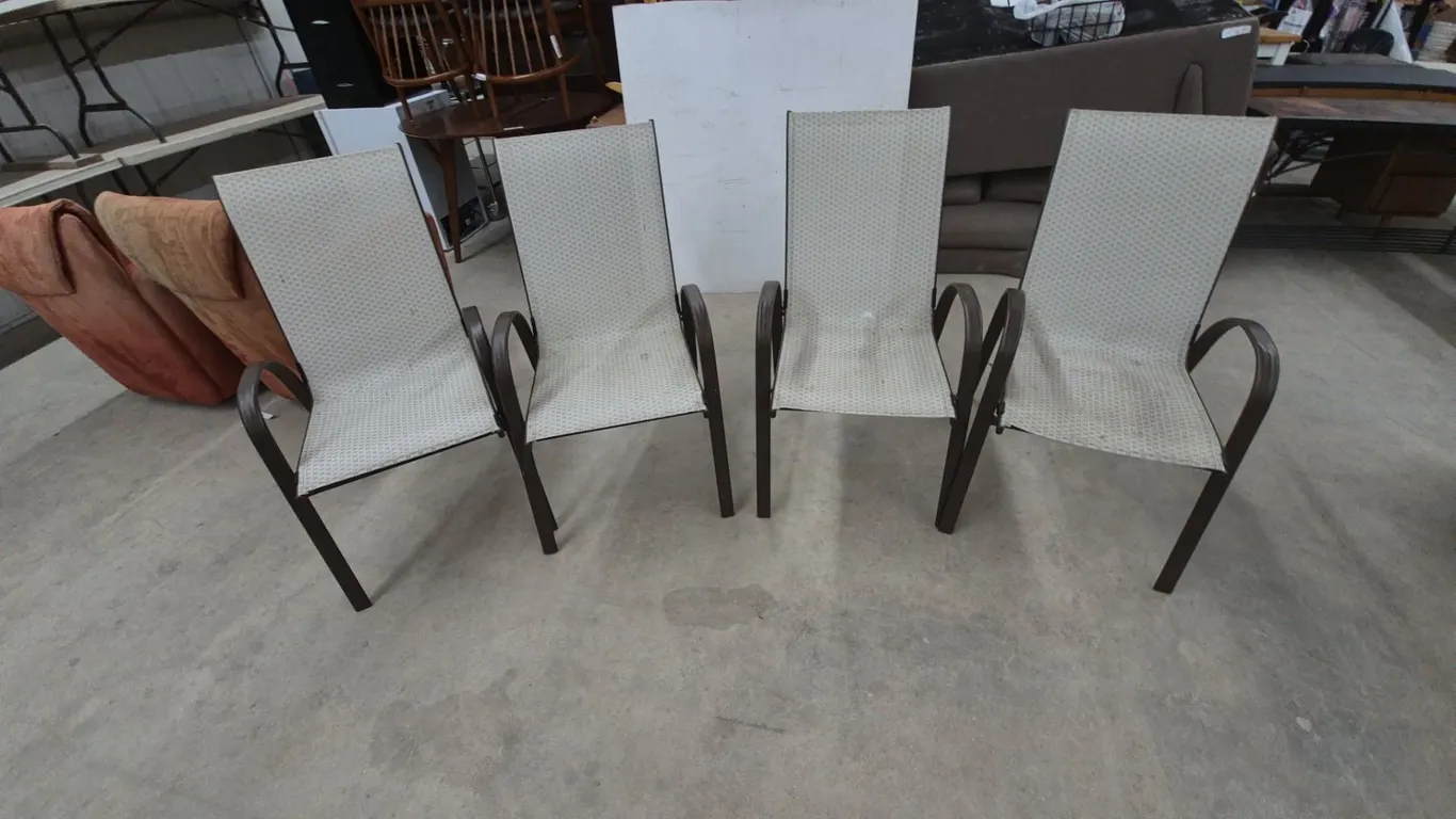 Four Patio Chairs. Stackable