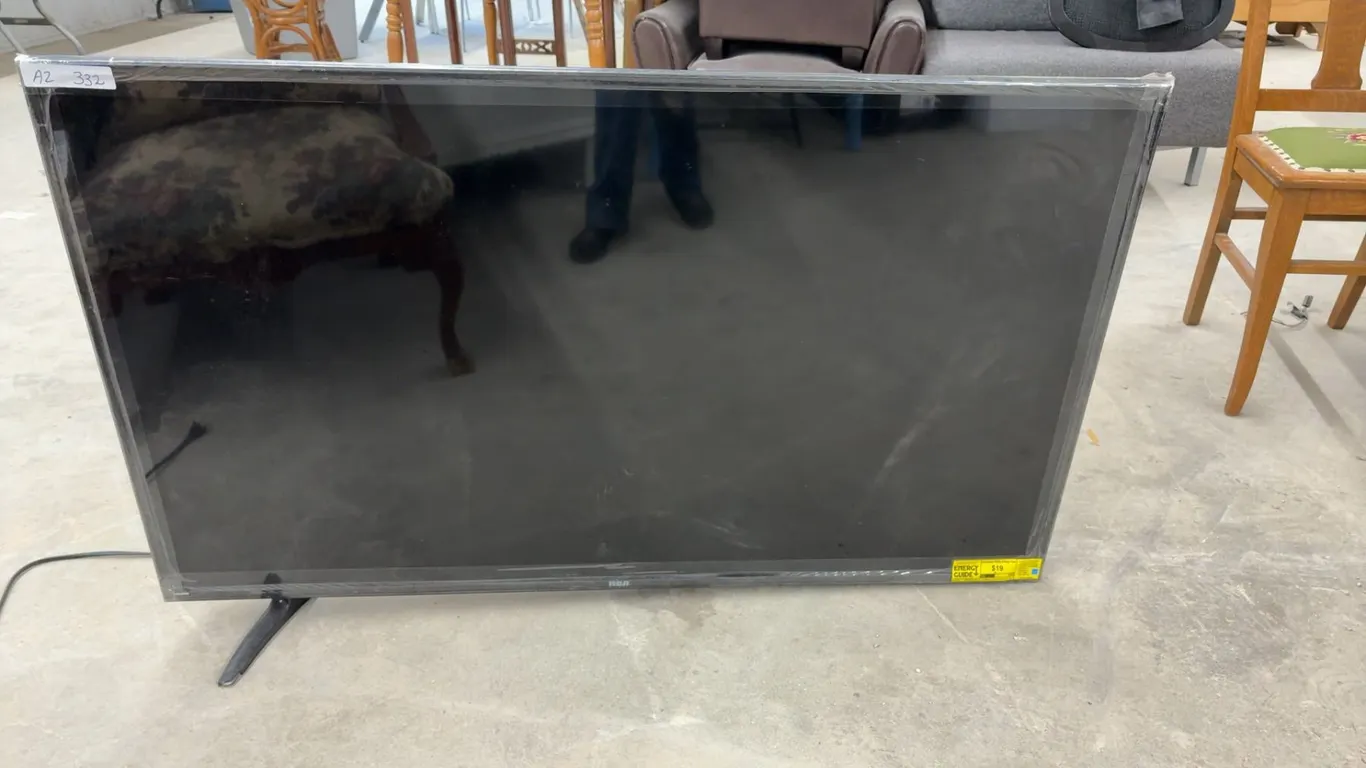 RCA 55” UHD LED TV with ATSC Tuner, Power Cord, No Remote, Missing 1 Leg