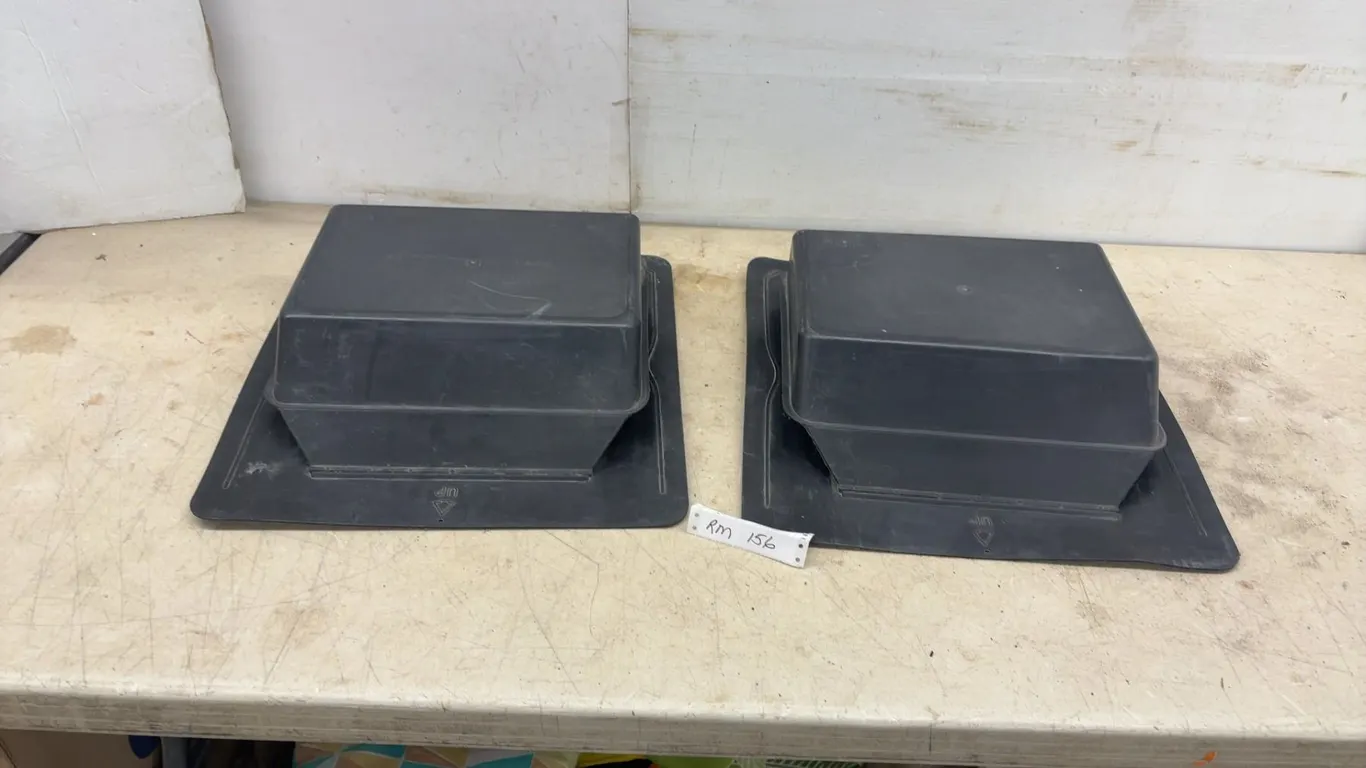 Two Black Plastic Roof Vents