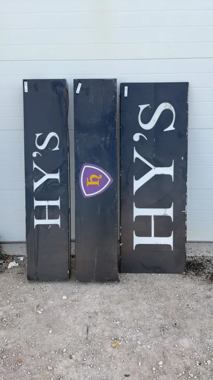 Three "Hy's" Restaurant Light-Up Signs and "H" Shield Logo Sign