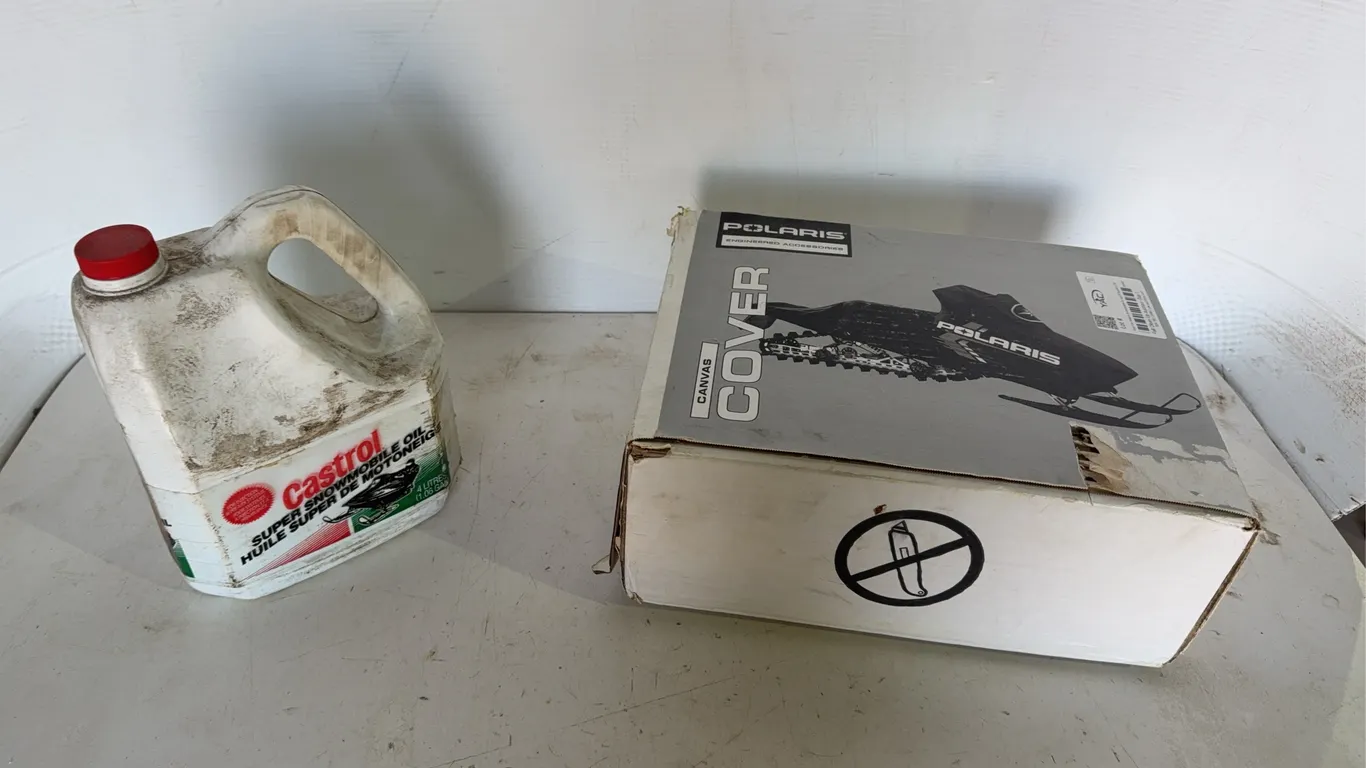 Tarp For Polaris Snowmobile & Jug Of Injection Oil