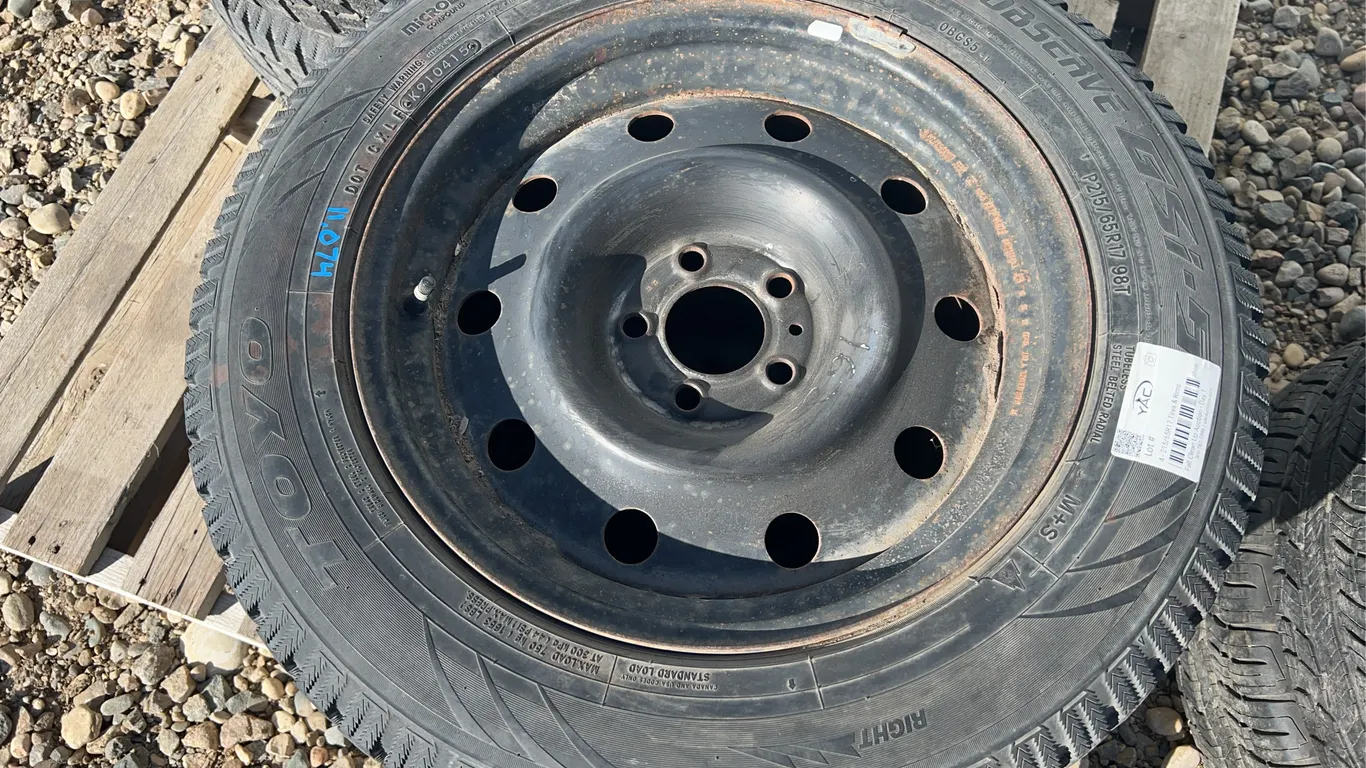 4 - 215/65R17 Tires & Rims