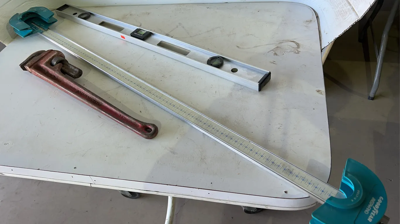 Pipe Wrench, Level, Metre Stick