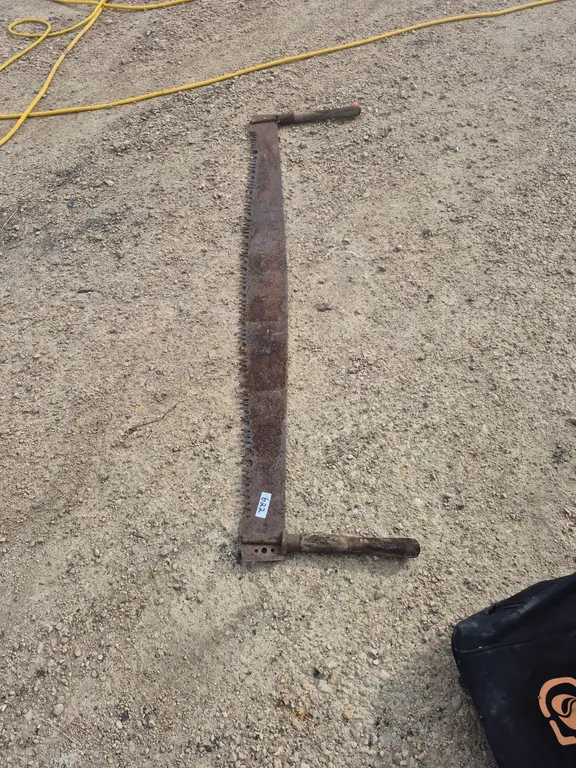 2 person antique saw.
