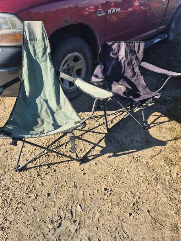 2 folding chairs.