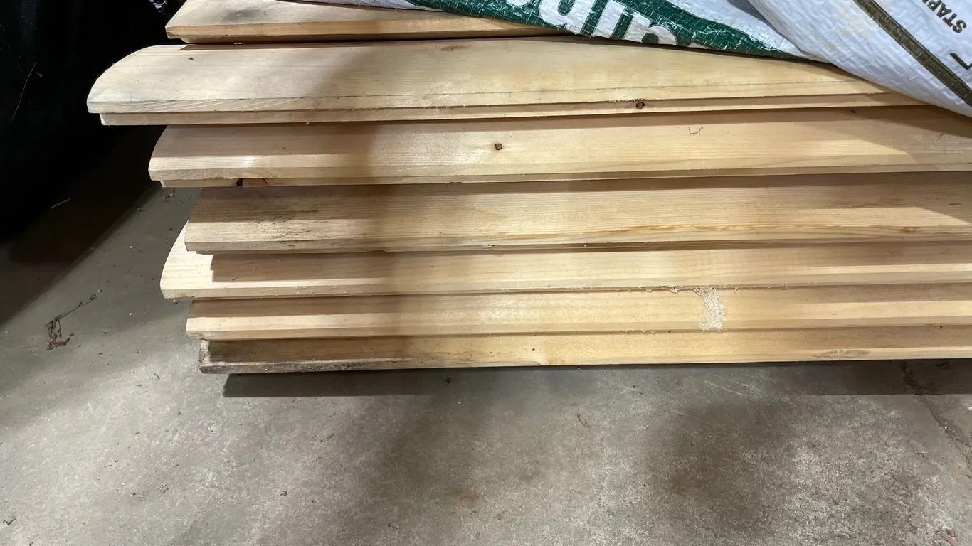Stack of 16' Unfinished Wood Log Siding Planks