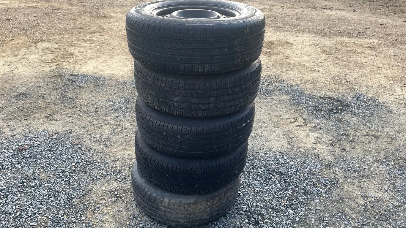 (4) Hankook Tires and (1) Douglas Spare Tire