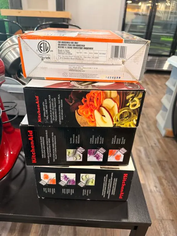 (3) Boxes of Kitchen Aid Attachments and Proctor Silex Burner