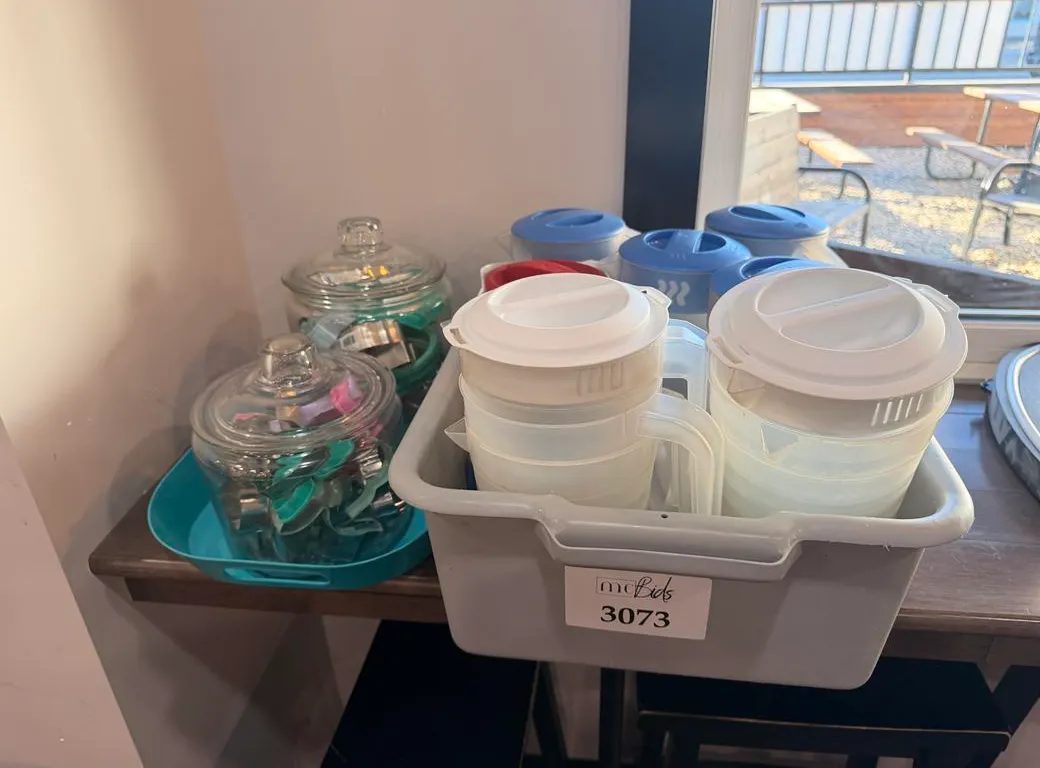 Tote of Juice Pitchers and (2) Jars of Cookie Cutters