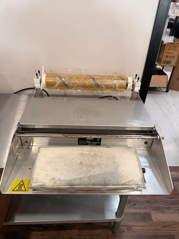 SEM International Shrink Wrapper