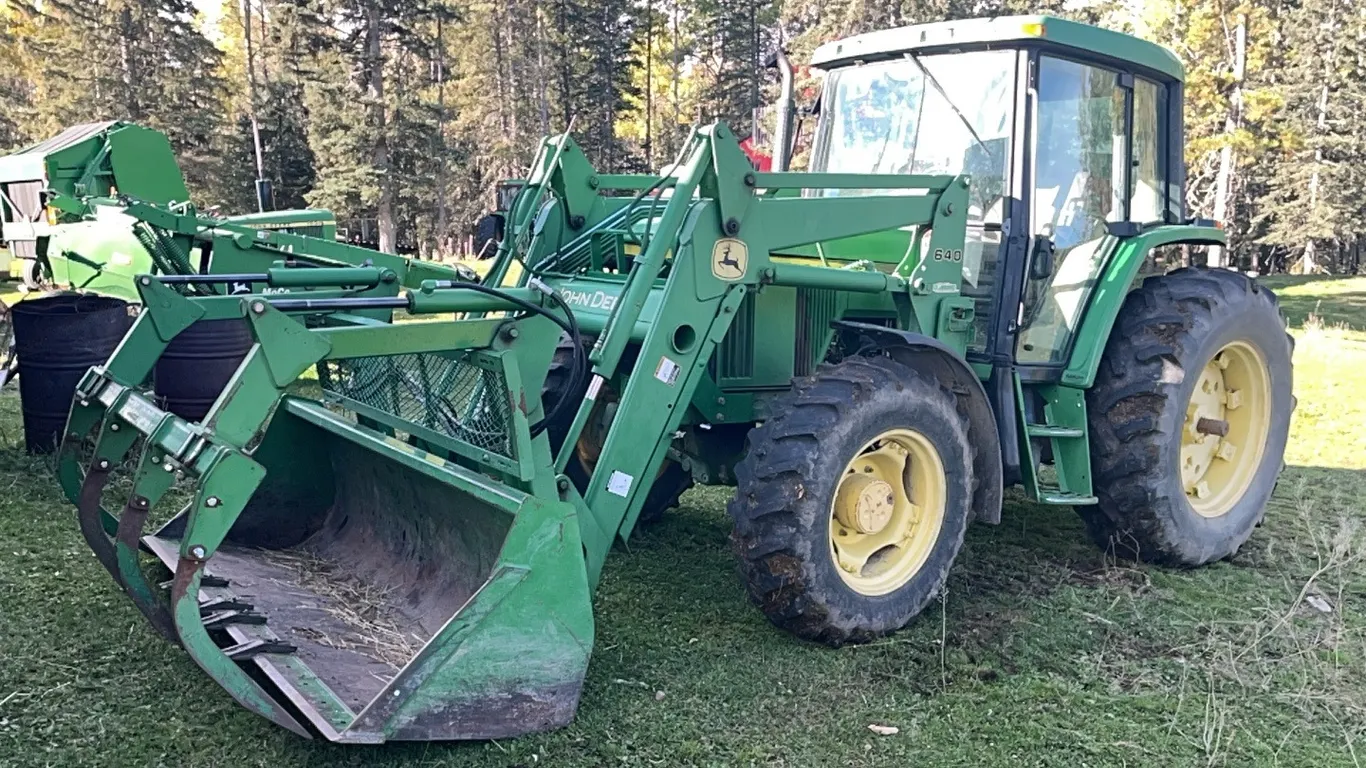 John Deere 6310 MFWD Tractor with John Deere 640 Front End Loader, s/n: L06310V307996